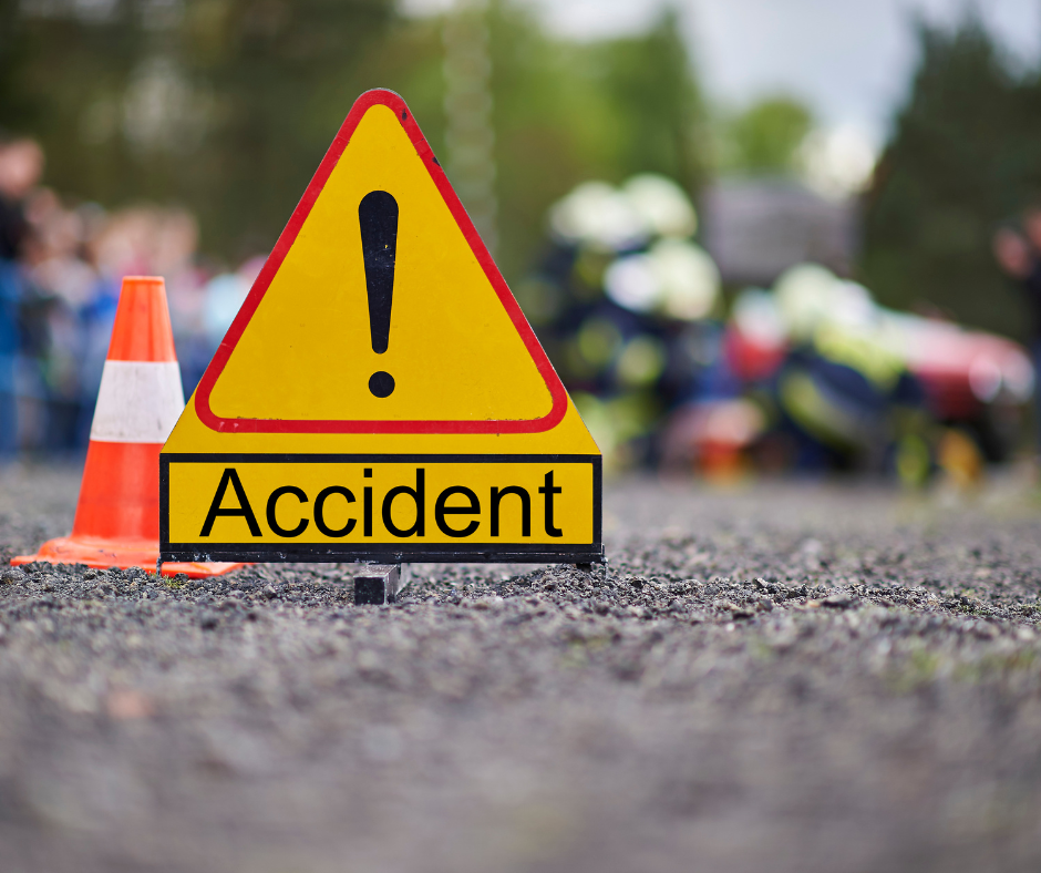 Accident sign with truck behind